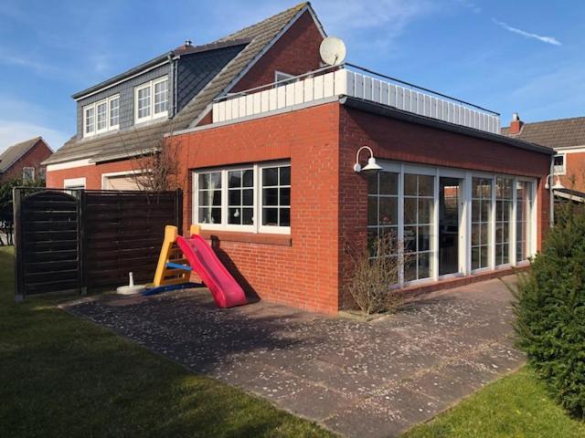 Haus Pamela Wohnung A Neuharlingersiel Bagian luar foto