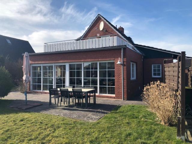 Haus Pamela Wohnung A Neuharlingersiel Bagian luar foto